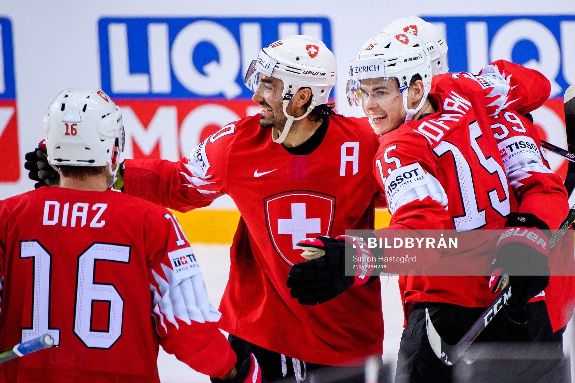 Andres Ambuh and Gregory Hofmann of Switzerland celebrate