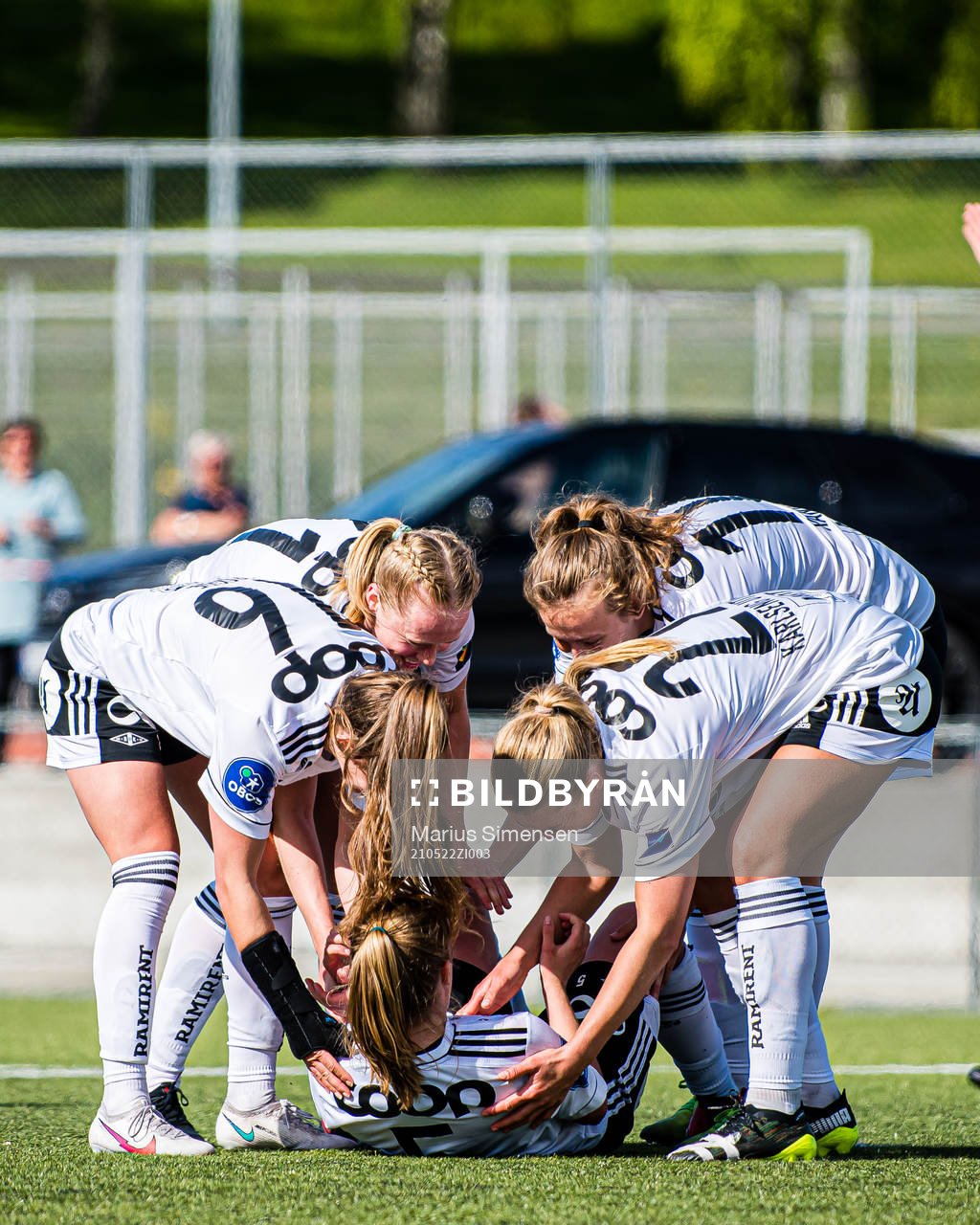 Cesilie Andreassen of Rosenborg (on the ground) celebrates