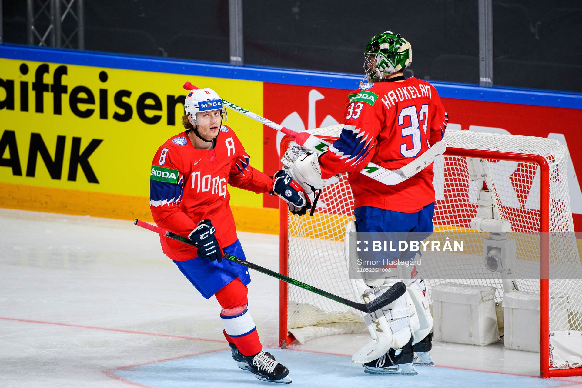 Mathias Trettenes and goalkeeper Henrik Haukeland of Norway