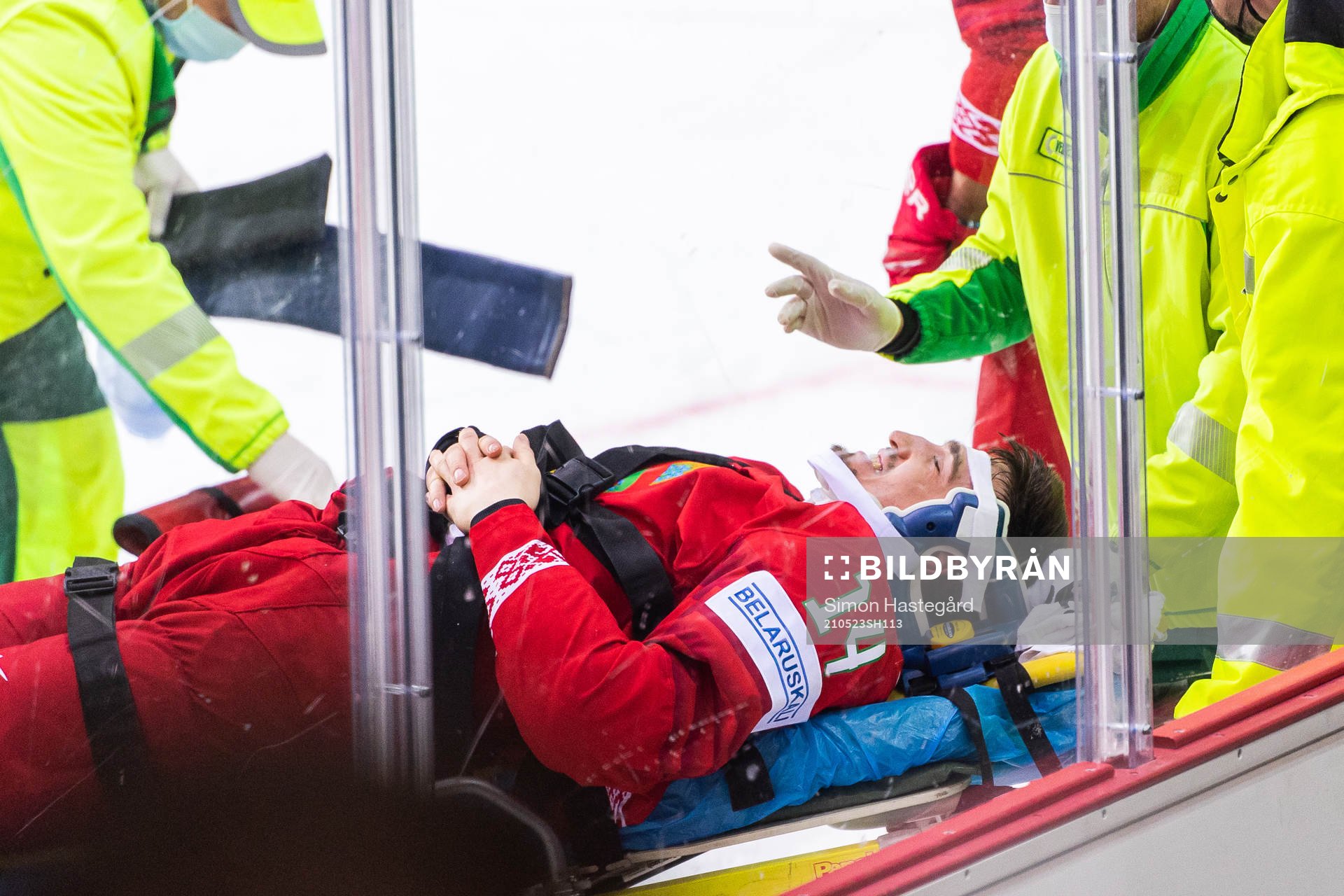 Yevgeni Lisovets of Belarus receives medical attention