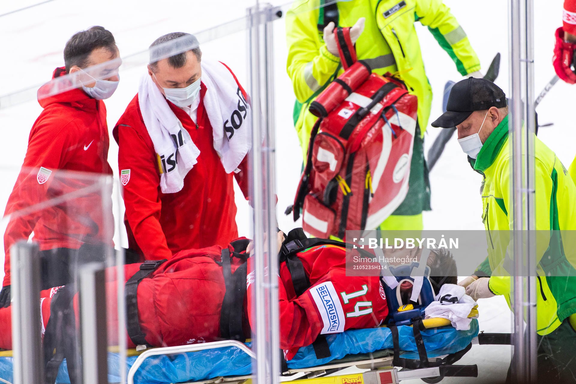 Yevgeni Lisovets of Belarus receives medical attention