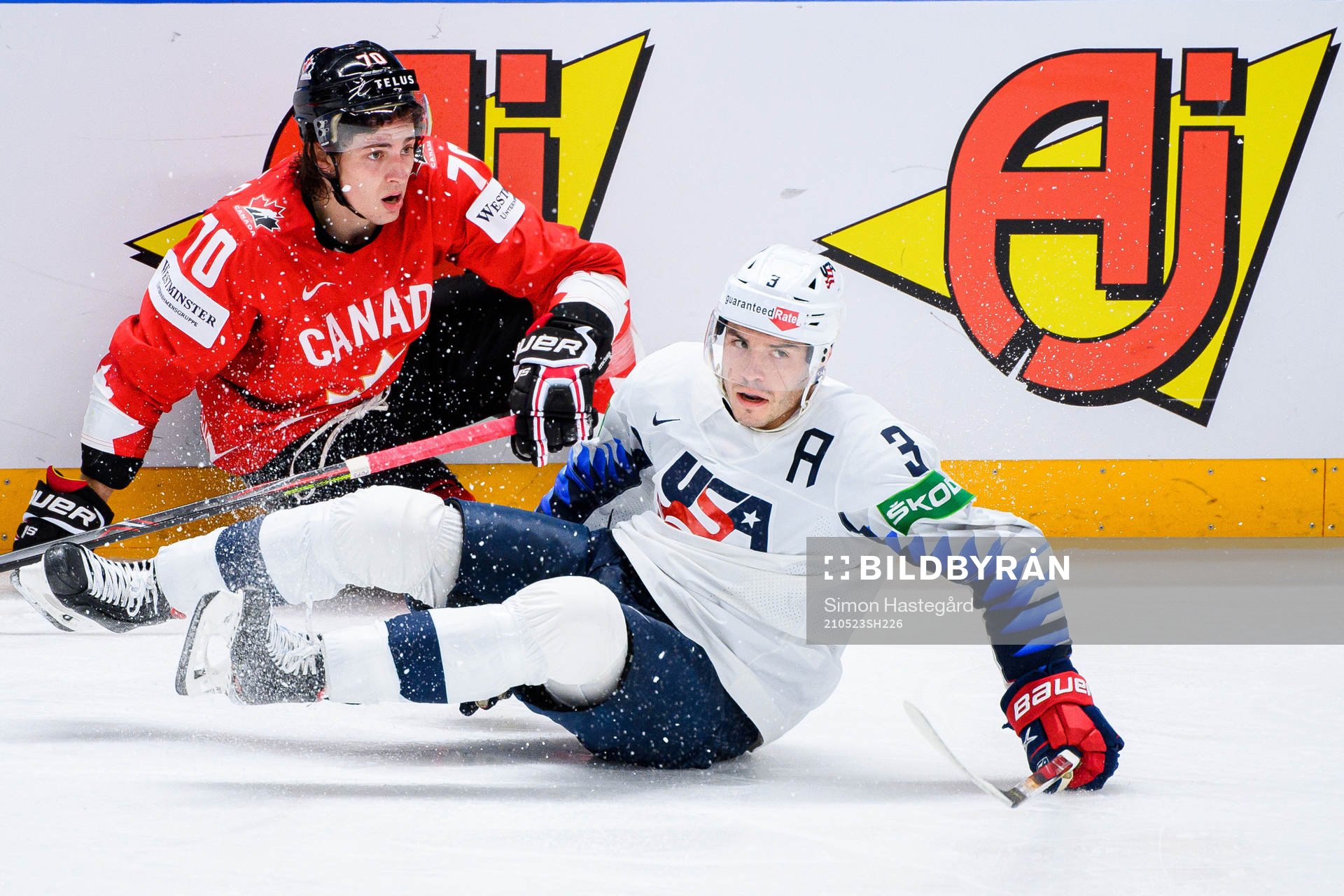 Troy Stecher of Canada and Matt Roy of USA