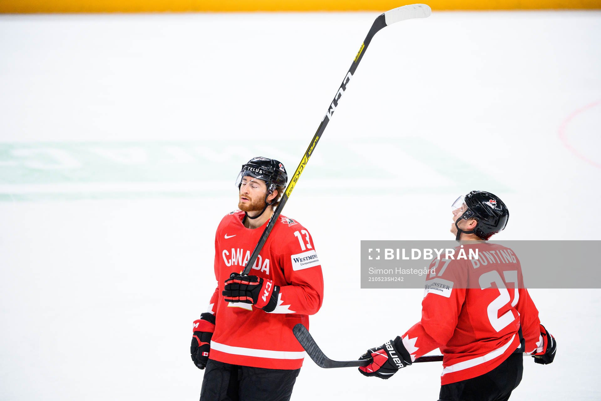 Gabriel Vilardi and Michael Bunting of Canada looks dejected