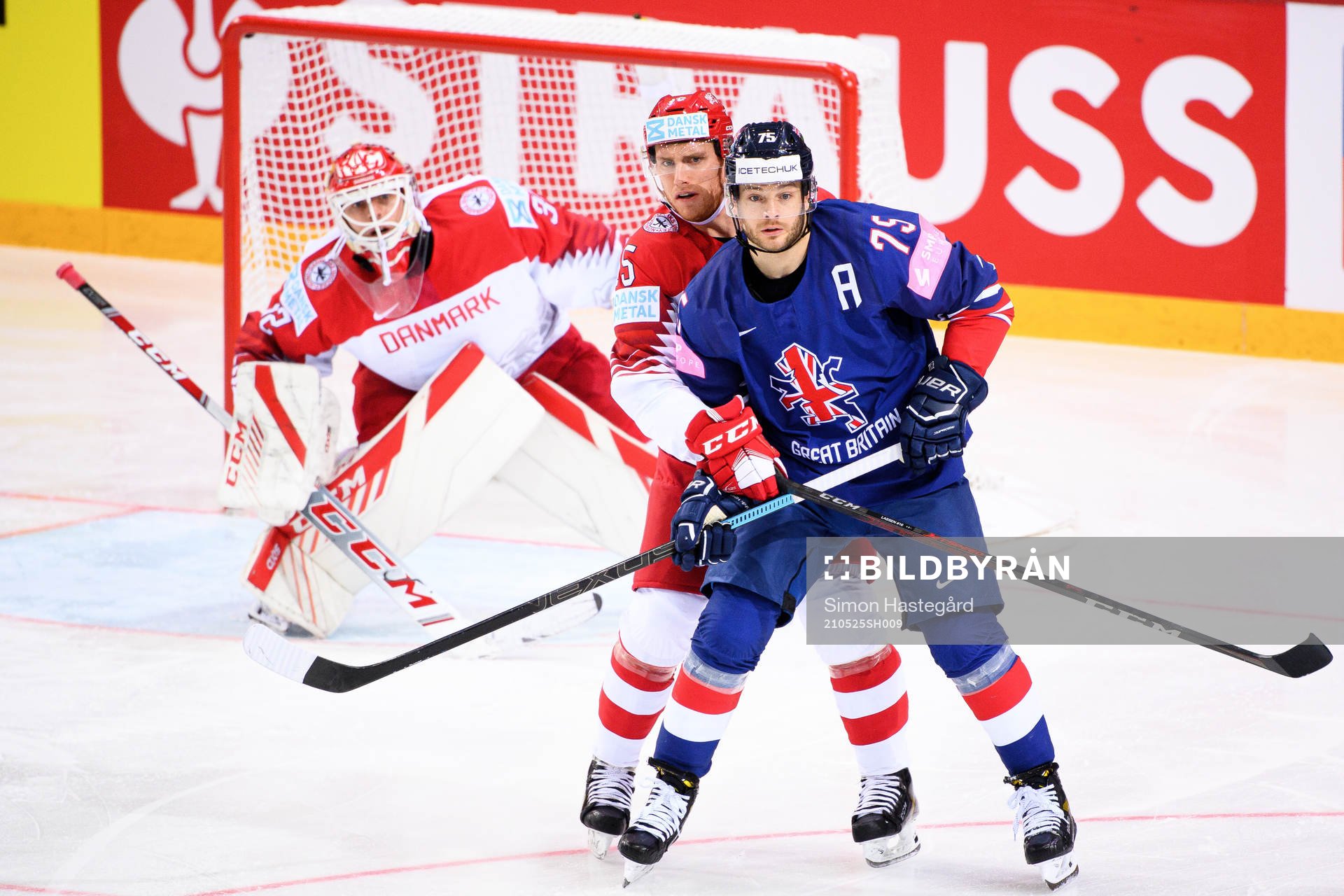 Matias Lassen and goalkeeper Sebastian Dahm of Denmark