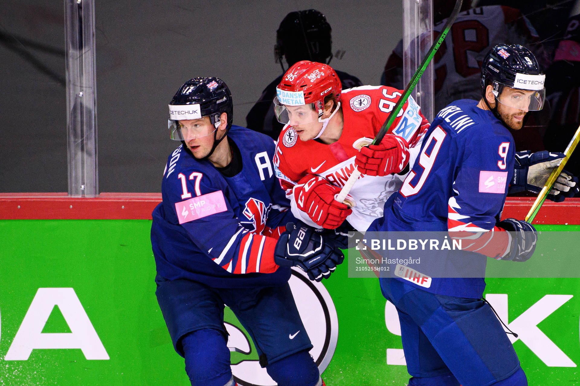 Nick Olesen of Denmark against Mark Richardson and Brett