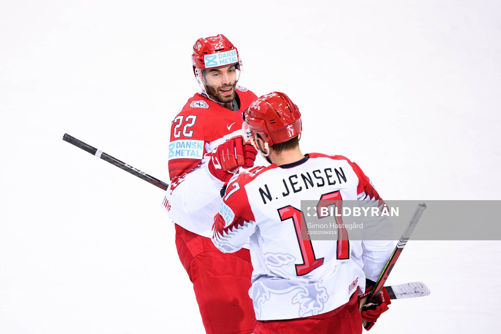Nicklas Jensen and Markus Lauridsen of Denmark celebrate