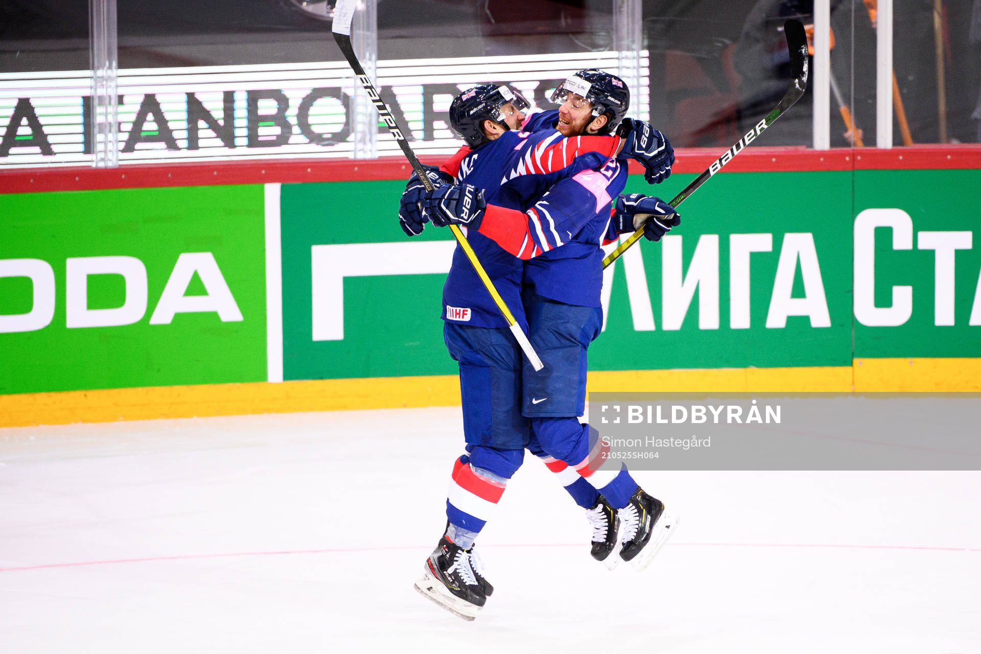 Ben Lake and Mike Hammond of Great Britain celebrate the