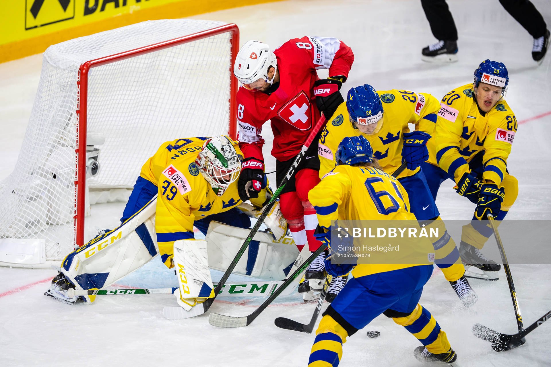 Goalkeeper Adam Reideborn of Sweden and Vincent Praplan of