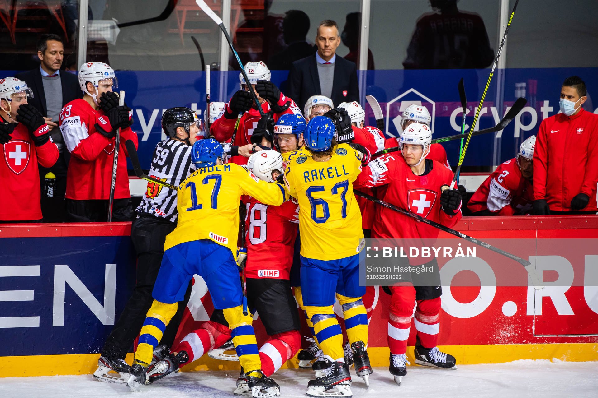 Pär Lindholm of Sweden and Timo Meier of Switzerland in a