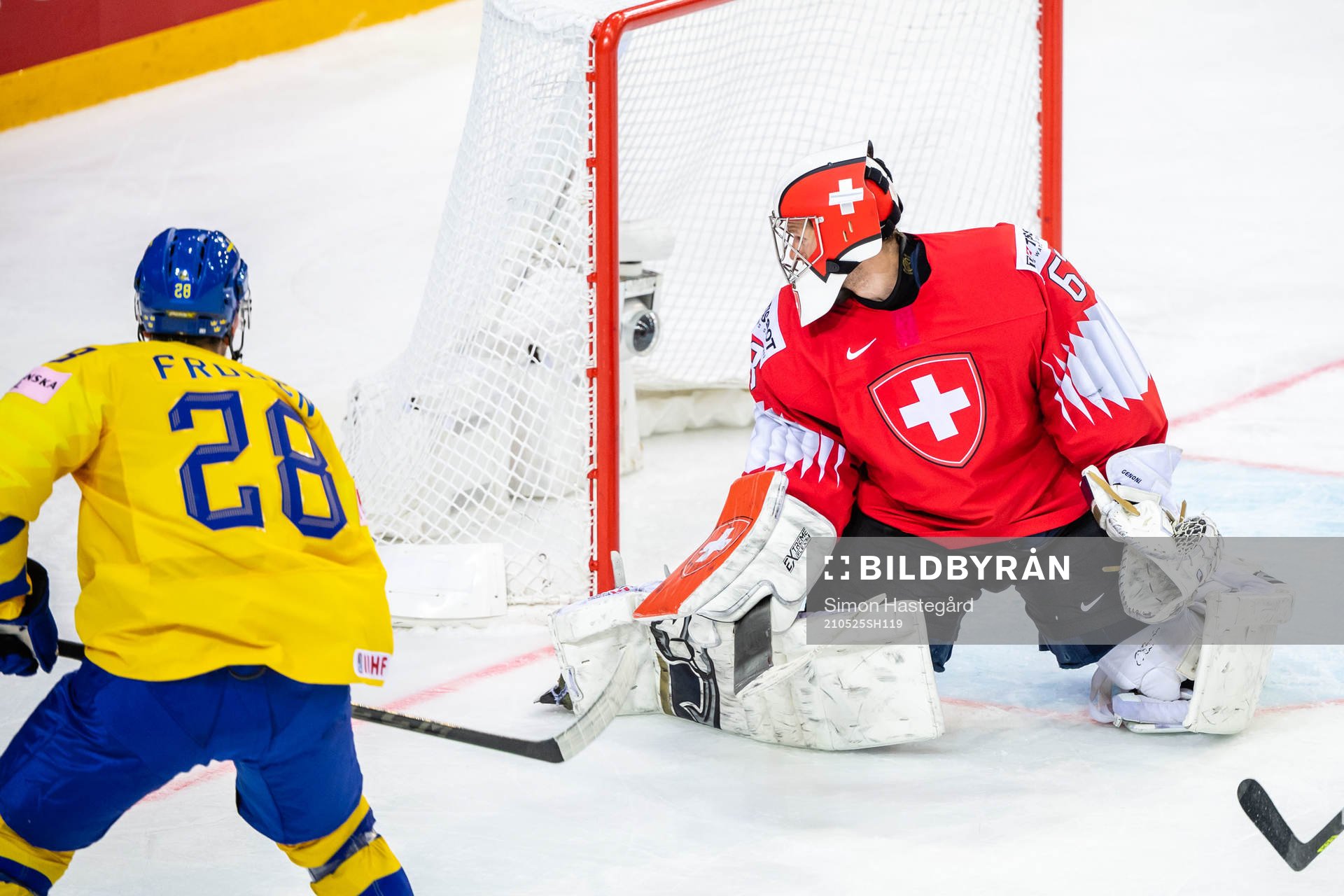 Jesper Frödén of Sweden scores 0-4 behind goalkeeper