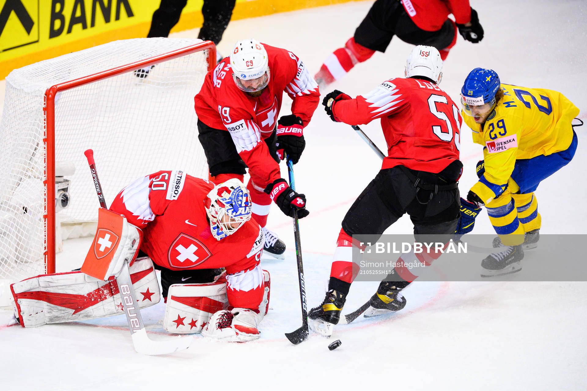 Adrian Kempe of Sweden against goalkeeper Melvin Nyffeler ,