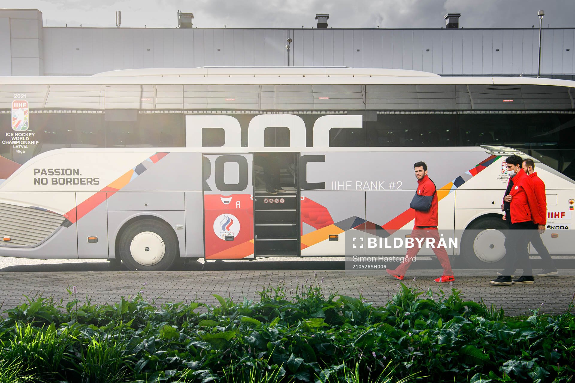 Members of Team Russia outside the ROC bus
