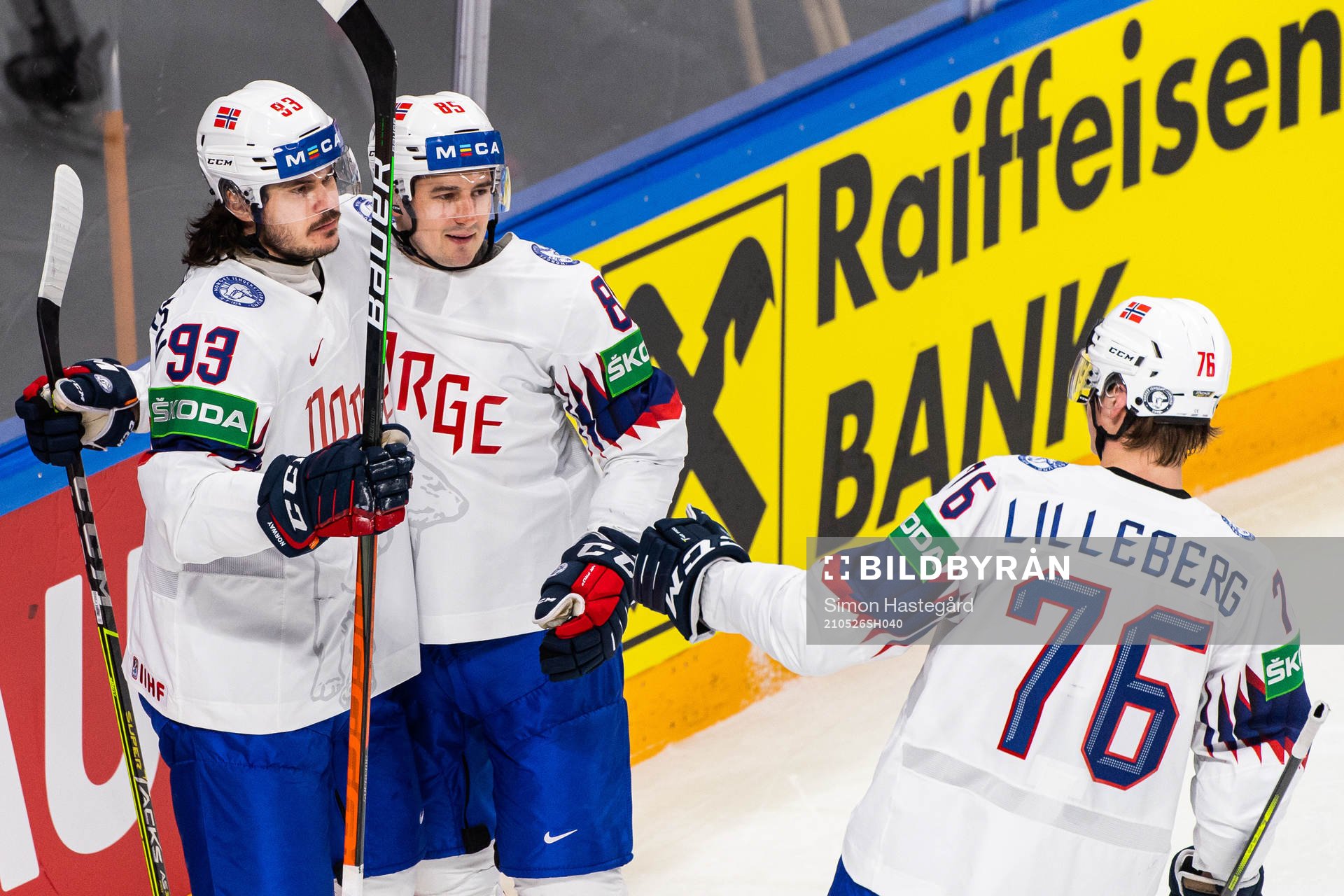 Thomas Valkvæ Olsen of Norway celebrates with Michael Haga