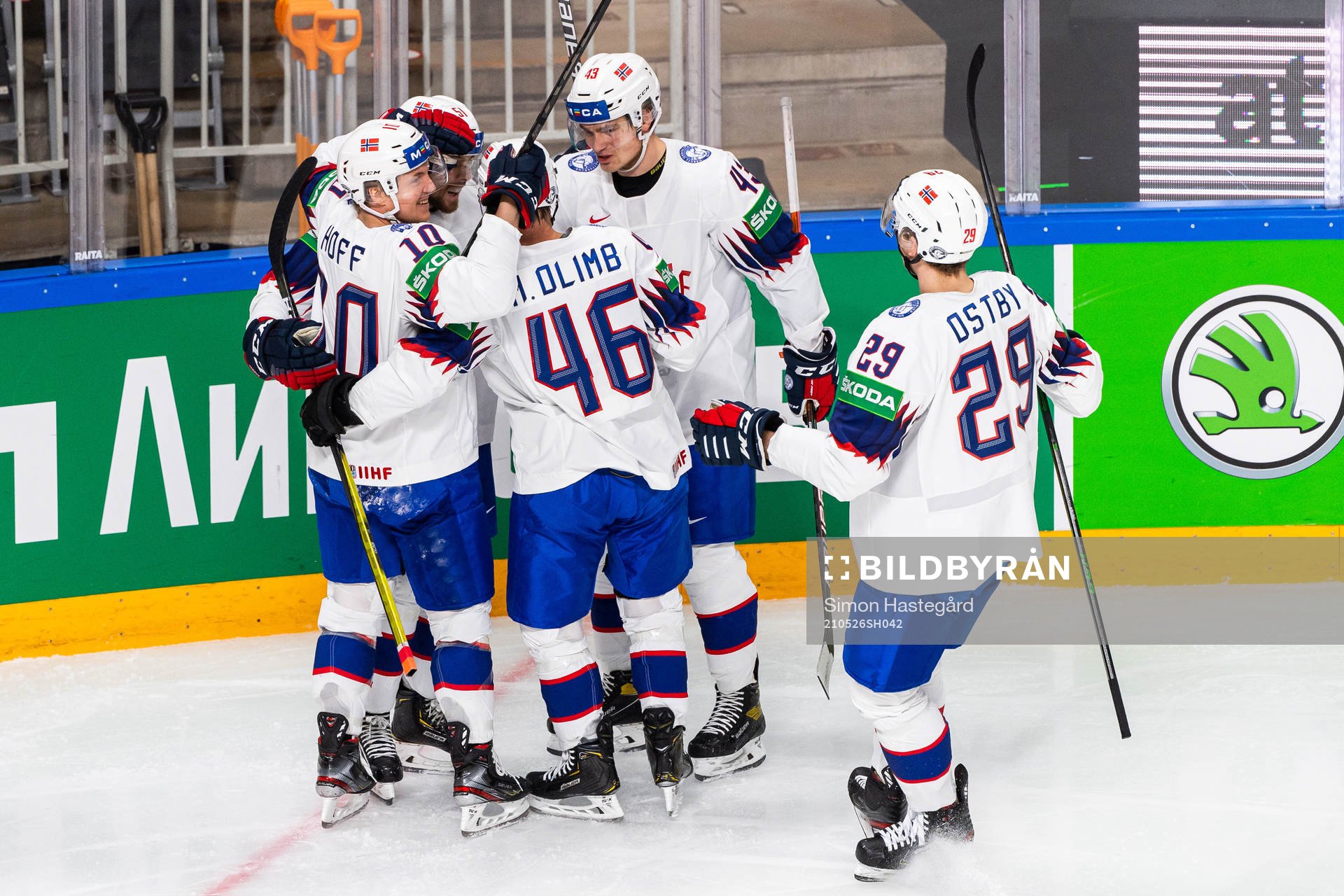 Mats Rosseli Olsen of Norway celebrates with team mates