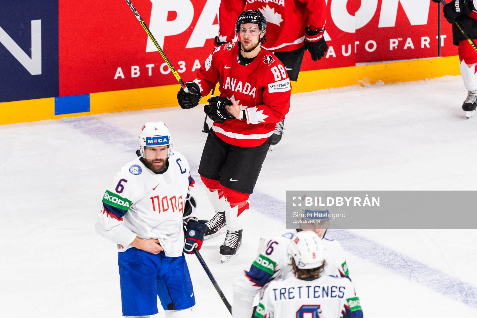 Andrew Mangipane of Canada looks dejected