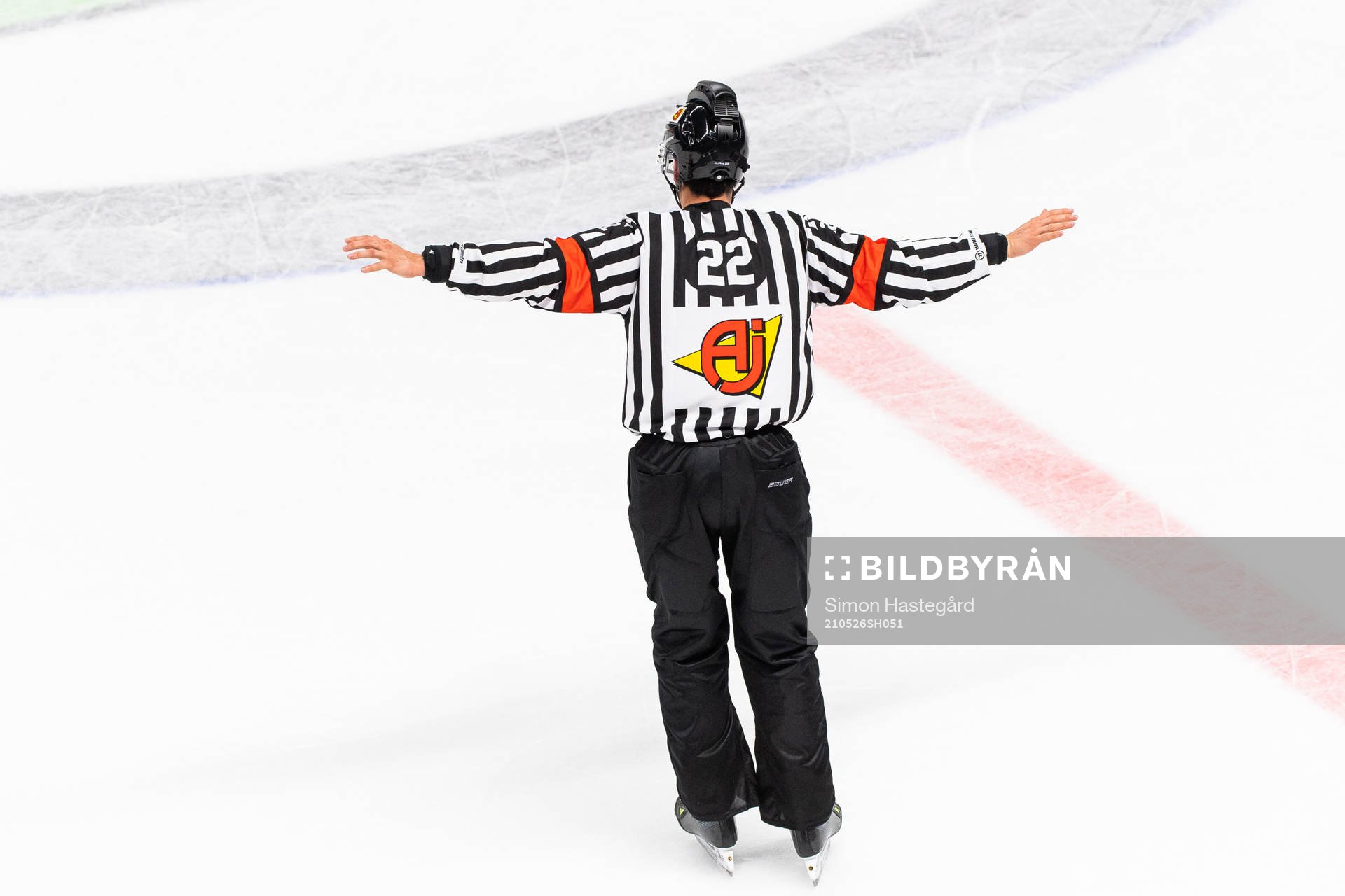 A referee calls ”No Goal”