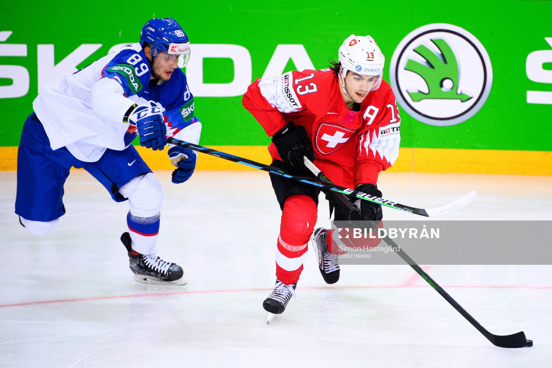 Adrian Holesinsky of Slovakia and Nico Hischier of