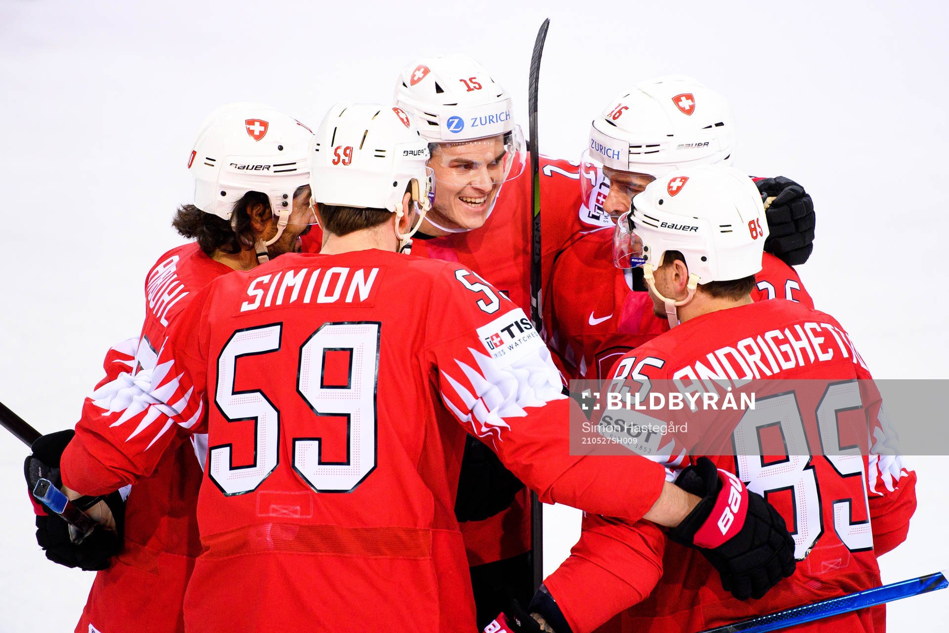 Gregory Hofmann and Raphael Diaz of Switzerland celebrates