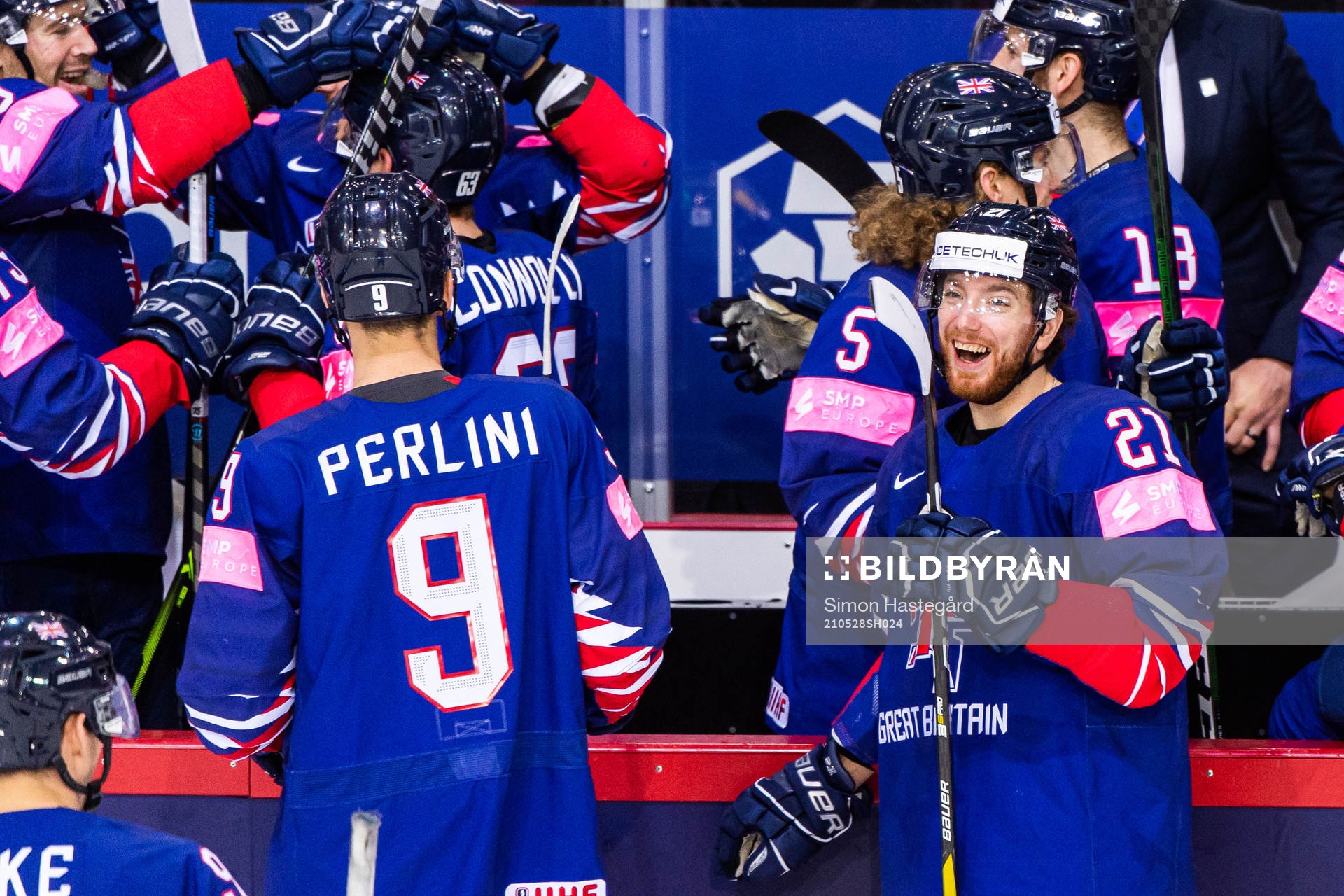 Brett Perlini and Mike Hammond of Great Britain celebrates