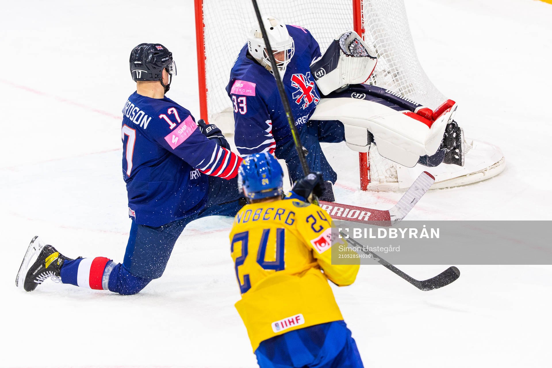 Oscar Lindberg of Sweden shoots against Mark Richardson and