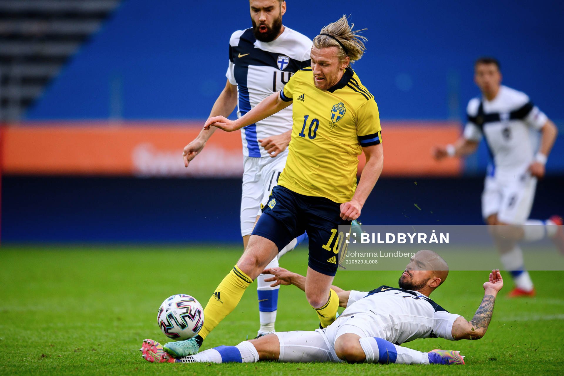 Emil Forsberg of Sweden and Nikolai Alho of Finland