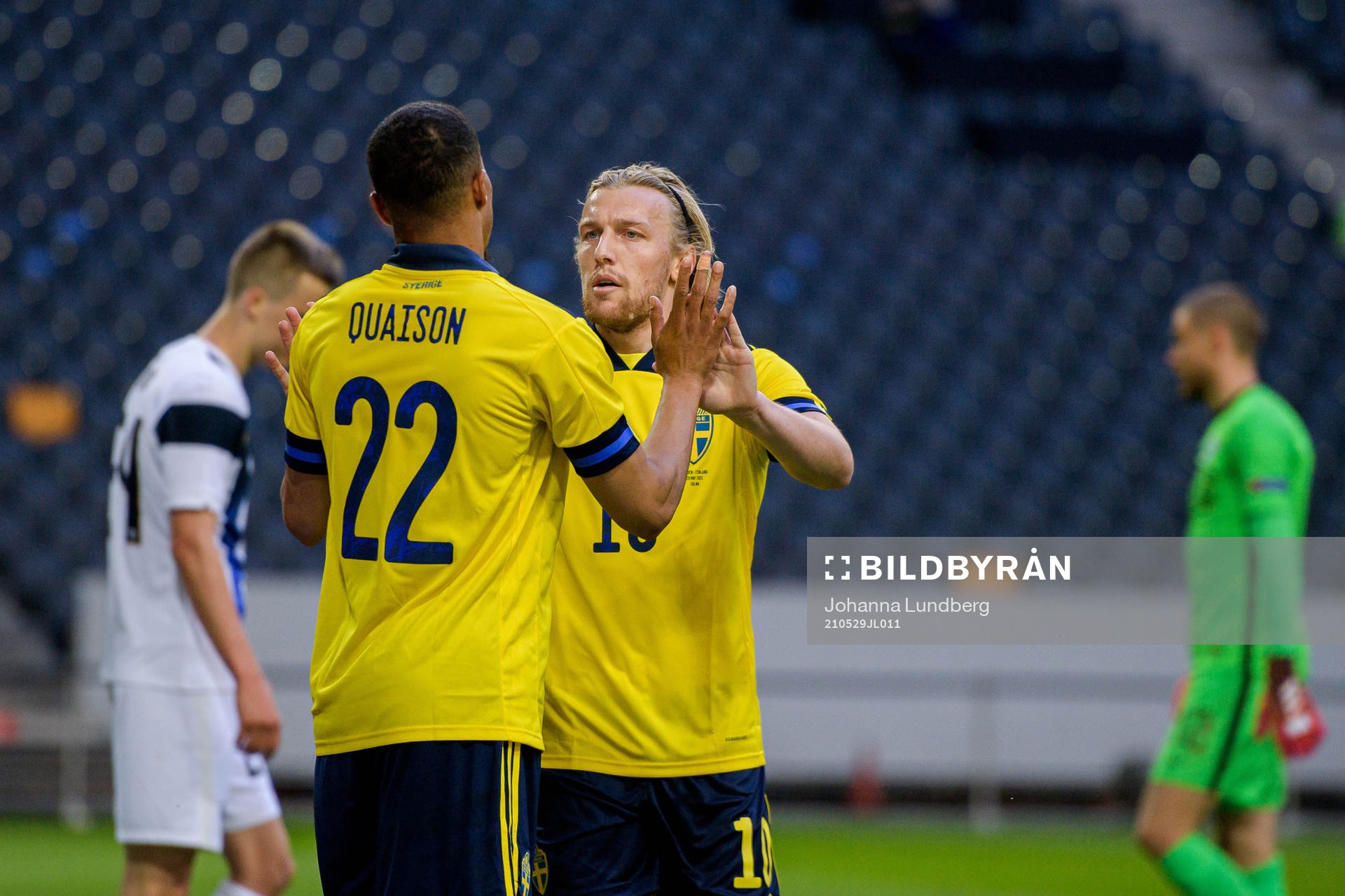 Robin Quaison and Emil Forsberg of Sweden celebrate the 1-0