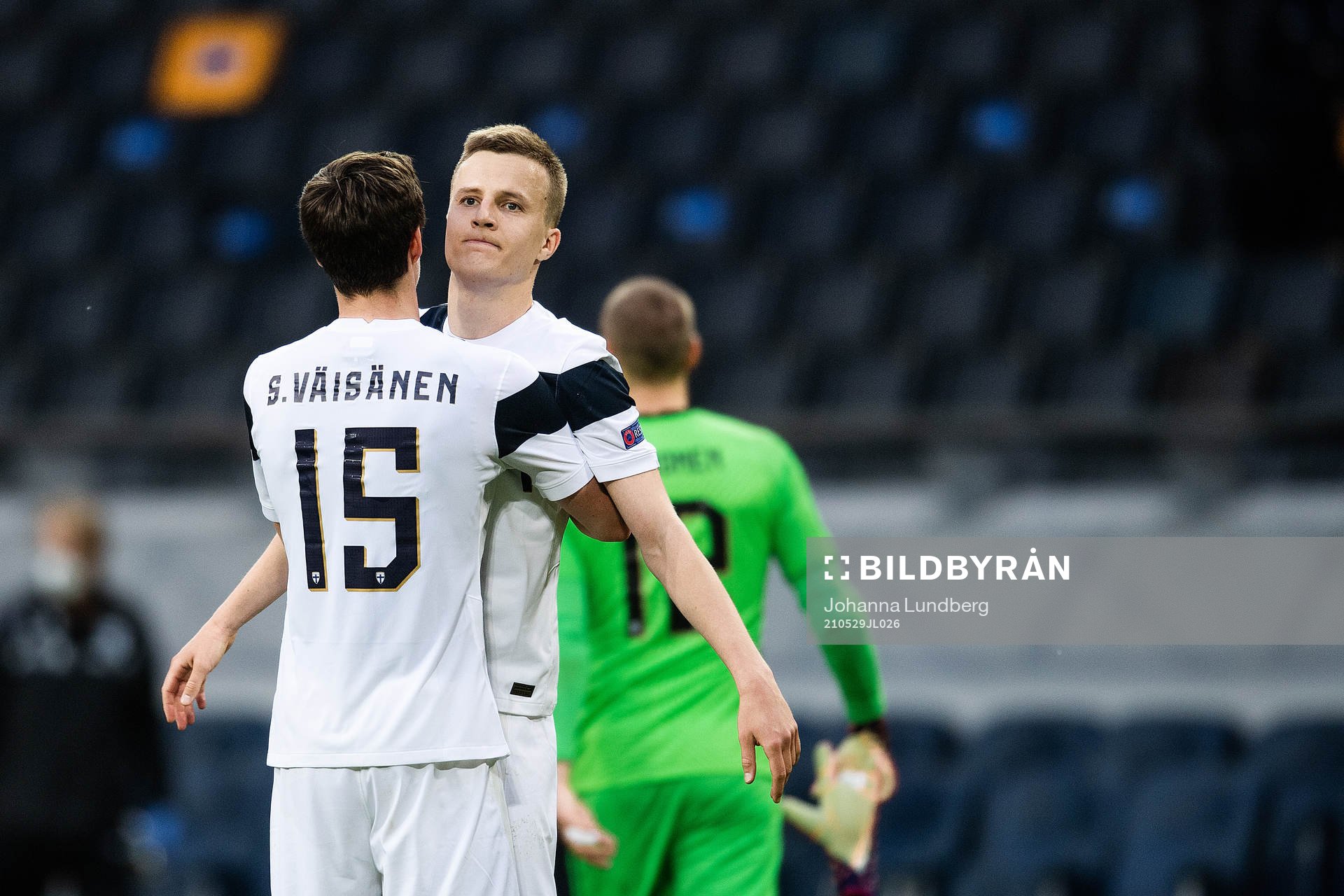 Robert Ivanov and Sauli Väisänen of Finland looks dejected