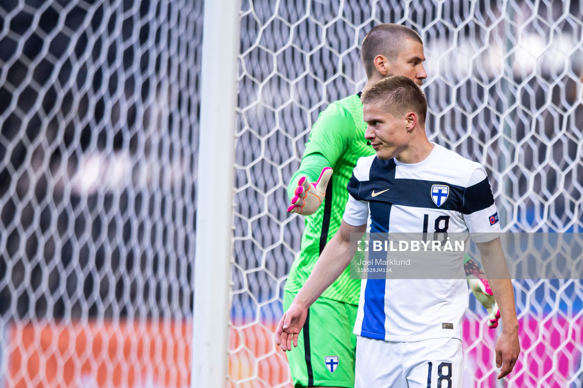 Goalkeeper Jesse Joronen and Jere Uronen of Finland