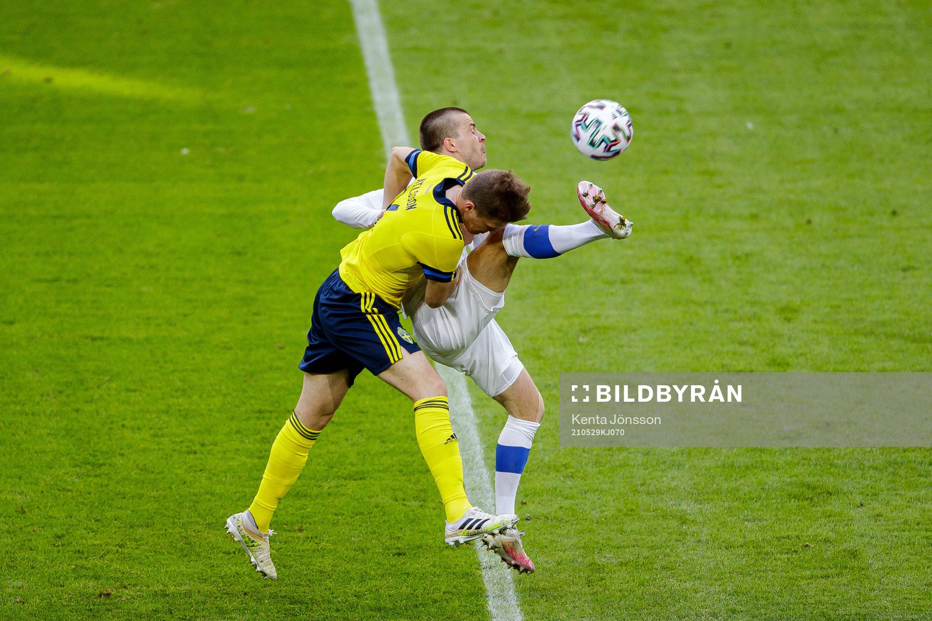 Joakim Nilsson of Sweden and Roope Riski of Finland during the international friendly football match between Sweden and Finland on May 29, 2021 in Stockholm. 