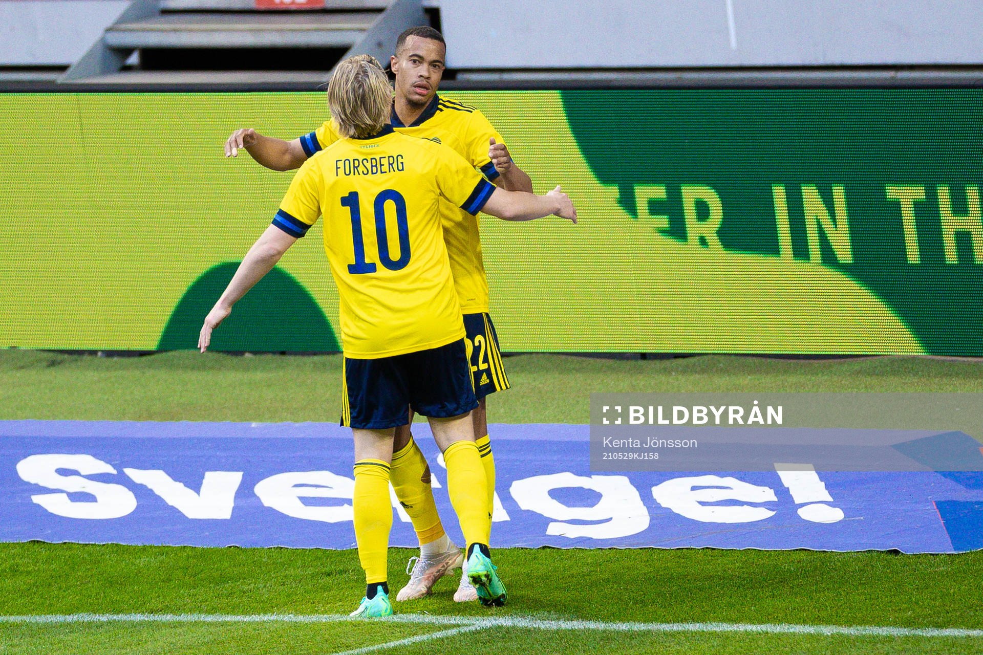 Robin Quaison of Sweden celebrates with Emil Forsberg
