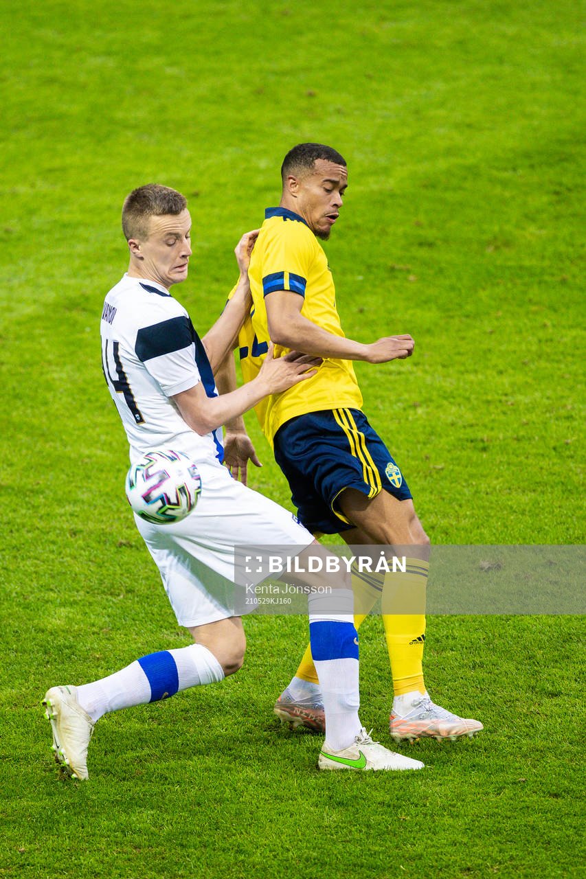 Robert Ivanov of Finland and Robin Quaison of Sweden