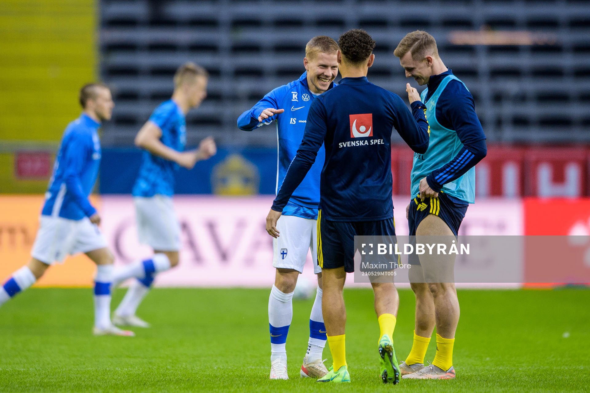 Jere Uronen of Finland with Emil Krafth and Jordan Larsson
