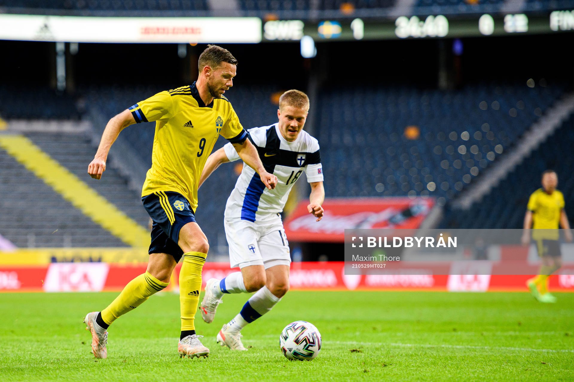 Marcus Berg of Sweden and Jere Uronen of Finland