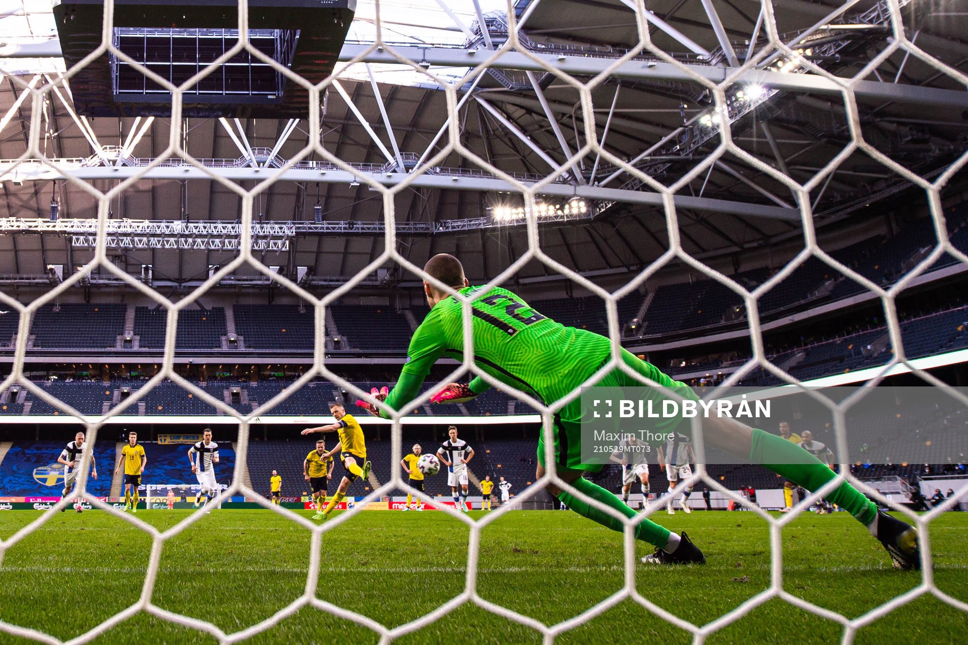 Sebastian Larsson of Sweden scores the 2-0 goal behind