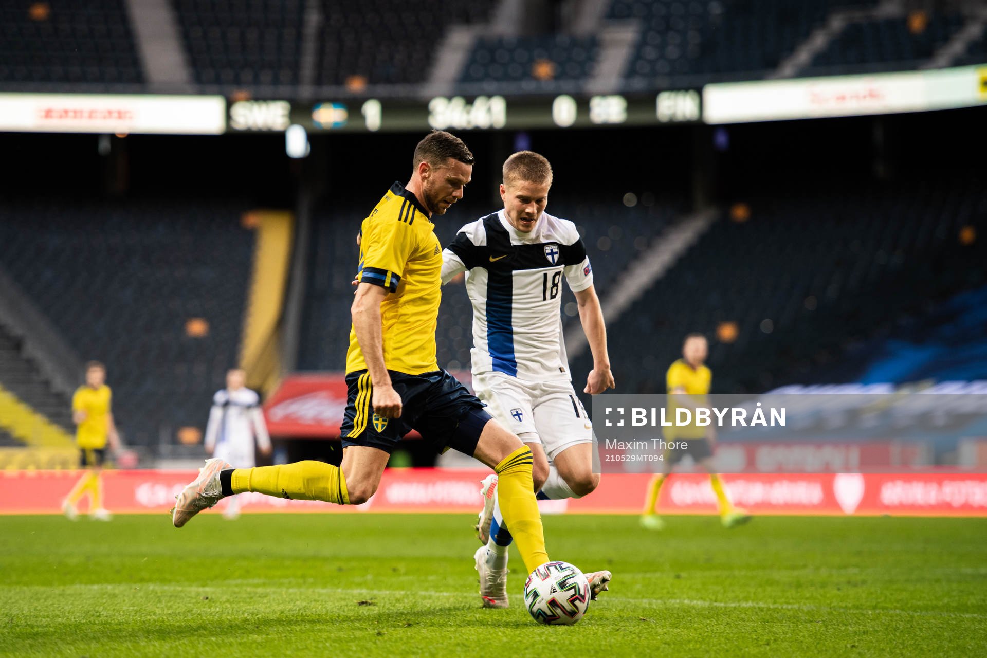 Marcus Berg of Sweden and Jere Uronen of Finland