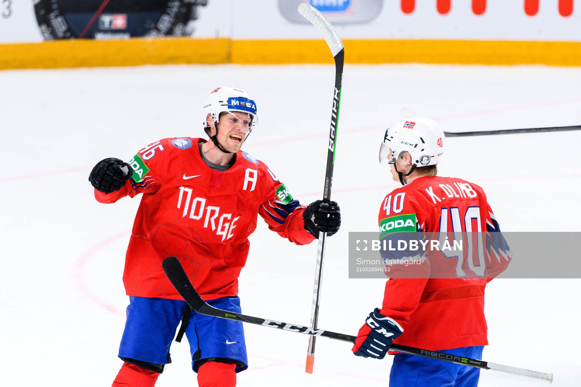 Mathis Olimb and Ken Andre Olimb of Norway celebrate the