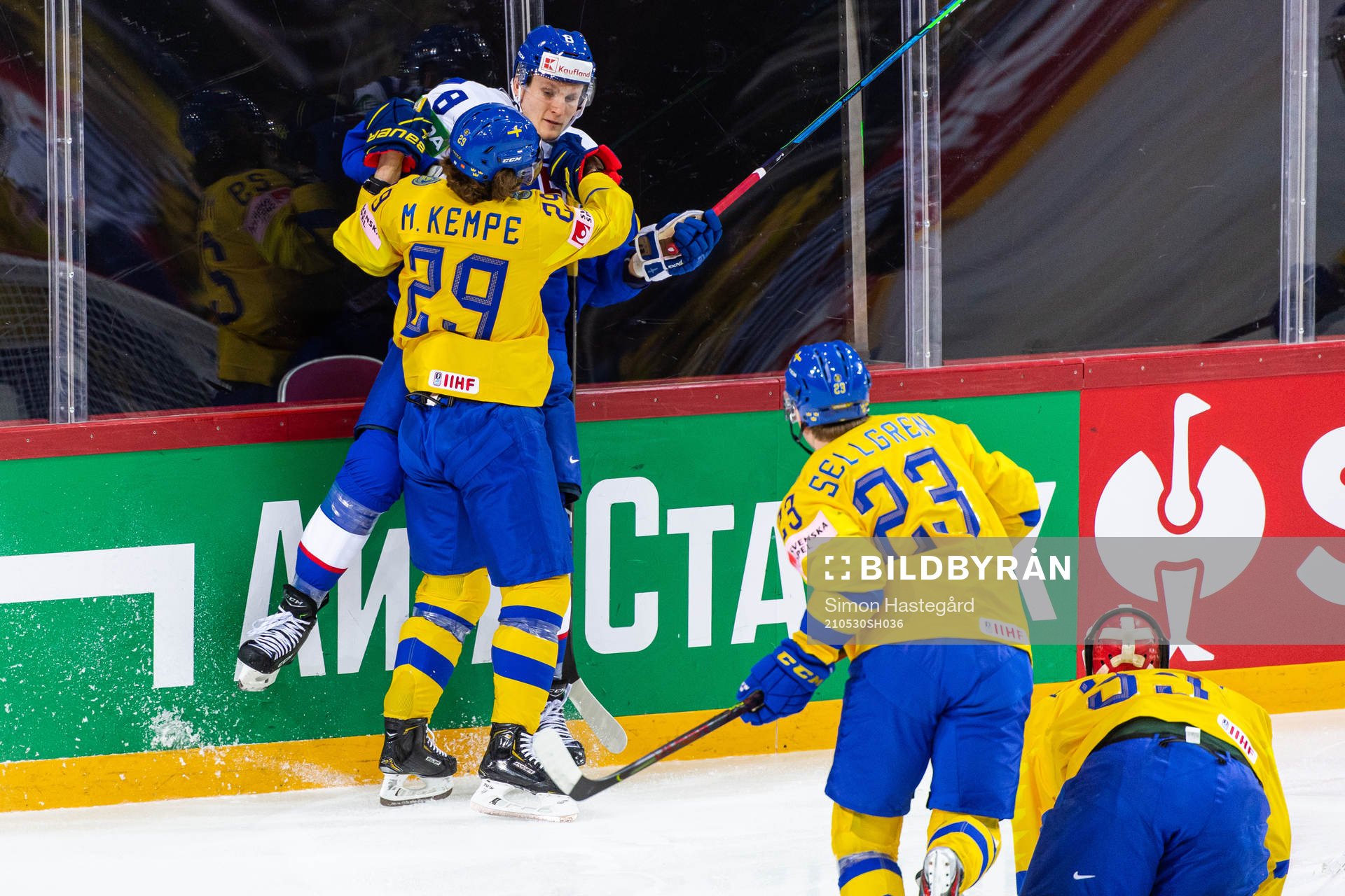 Mario Kempe of Sweden tackles Pavol Skalicky of Slovakia