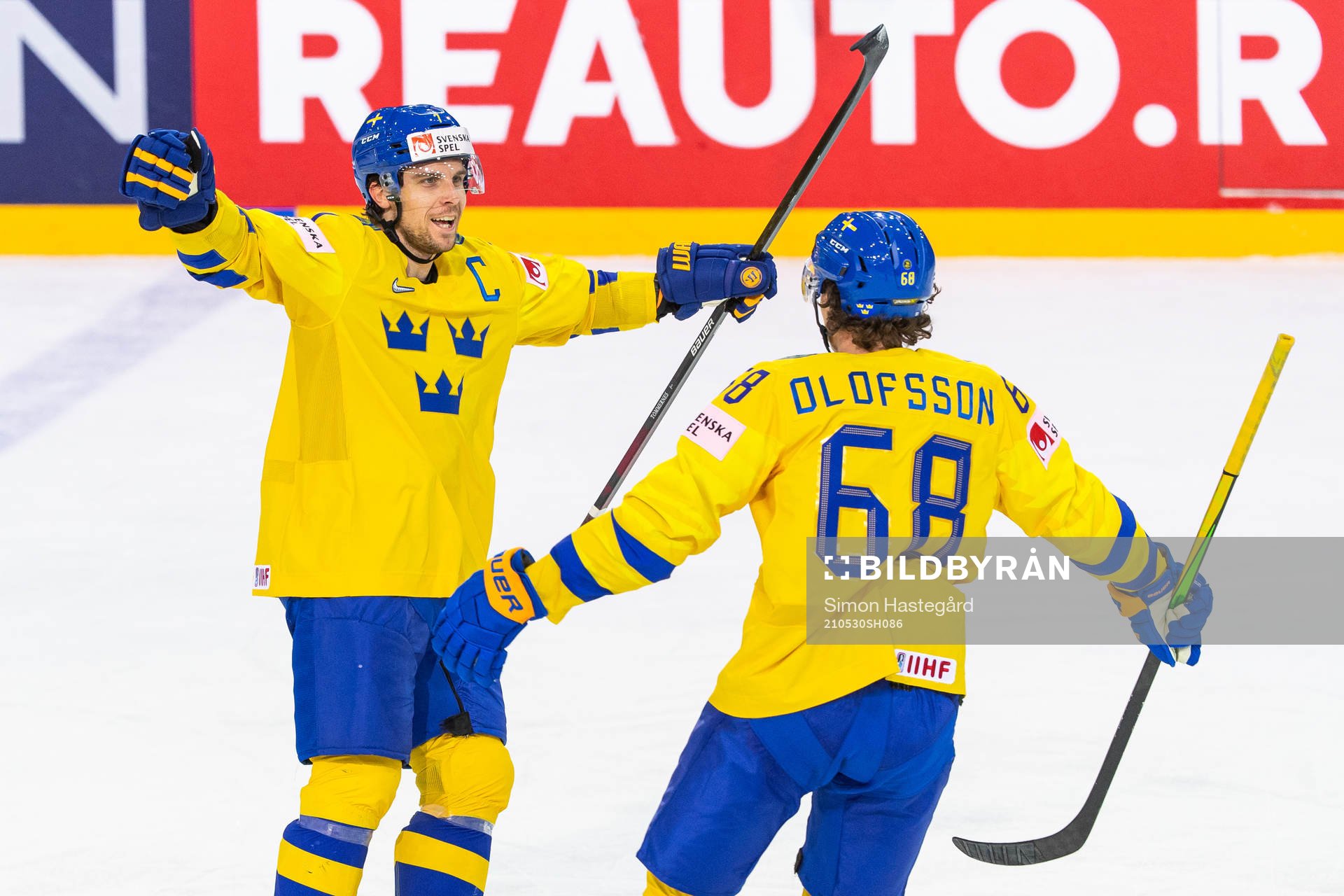 Henrik Tömmernes celebrates with Victor Olofsson of Sweden