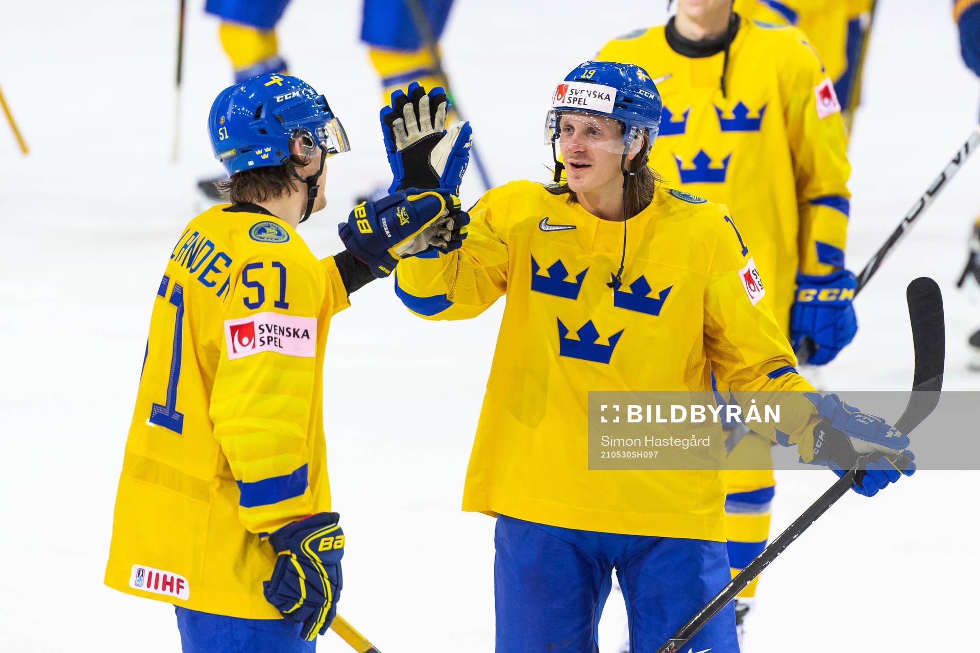 Filip Hållander and Marcus Sörensen of Sweden celebrate