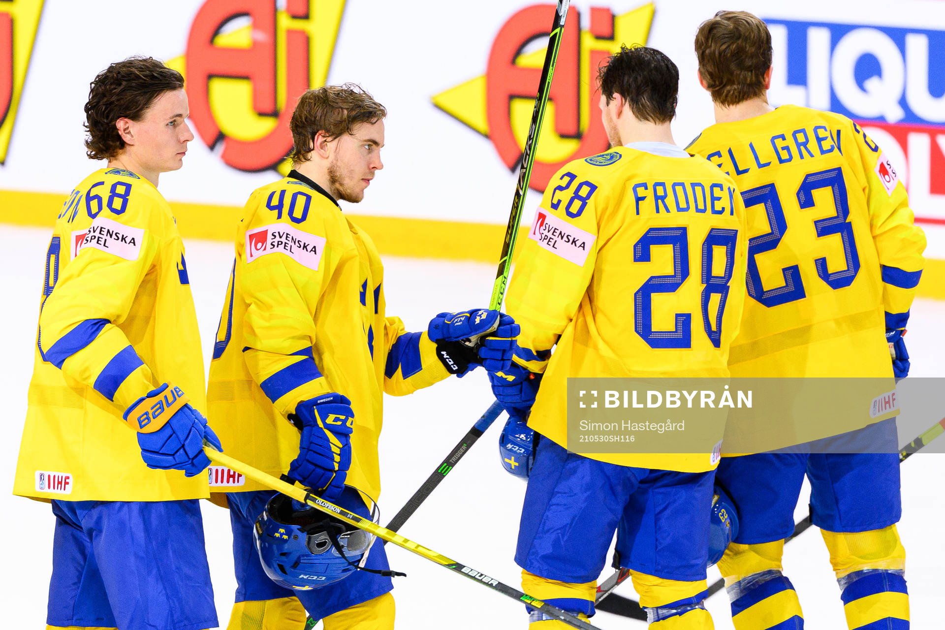 Victor Olofsson and Andreas Wingerli of Sweden celebrate