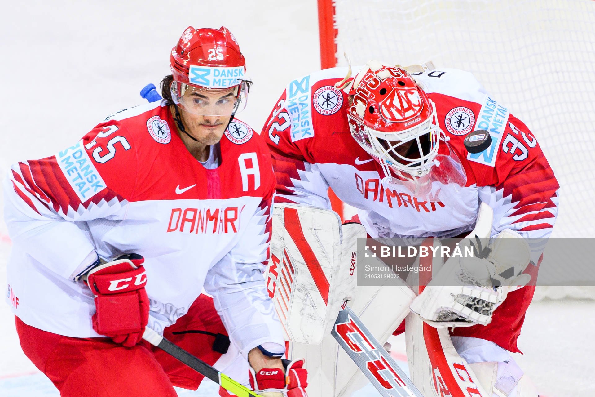 Oliver Lauridsen and goalkeeper Sebastian Dahm of Denmark