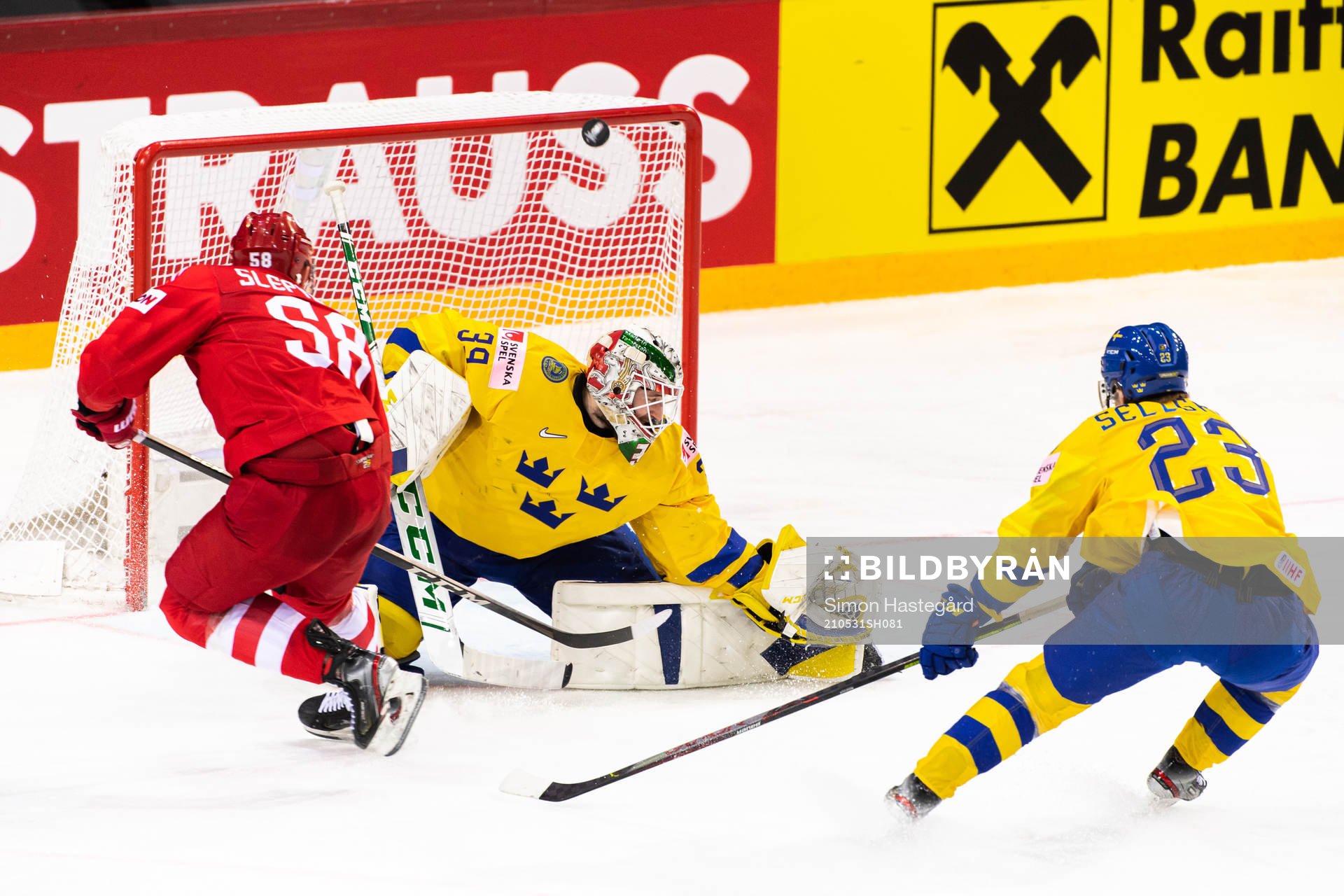 Goalkeeper Adam Reideborn of Sweden and Anton Slepyshev of