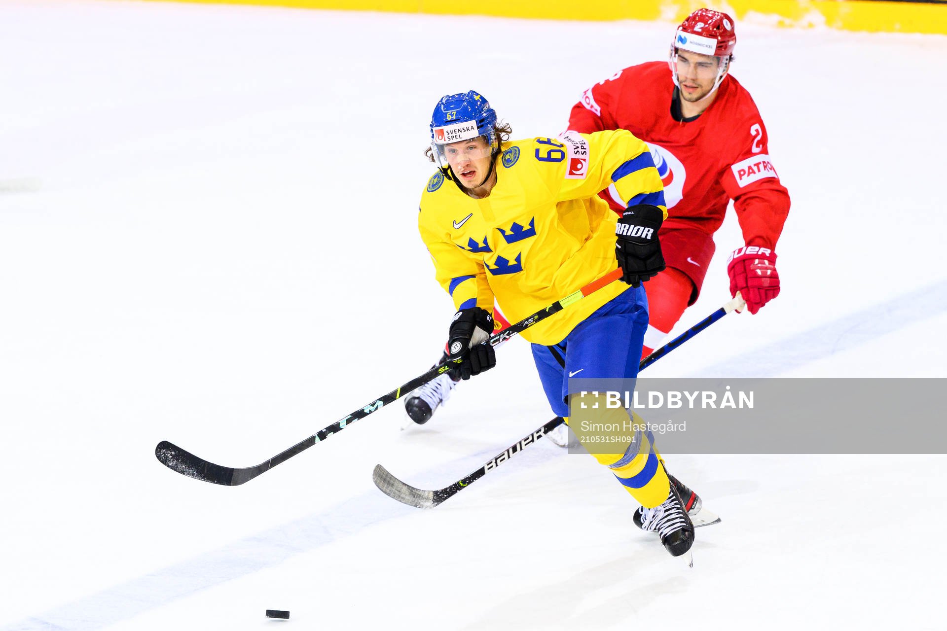 Rickard Rakell of Sweden and Artyom Zub of Russia