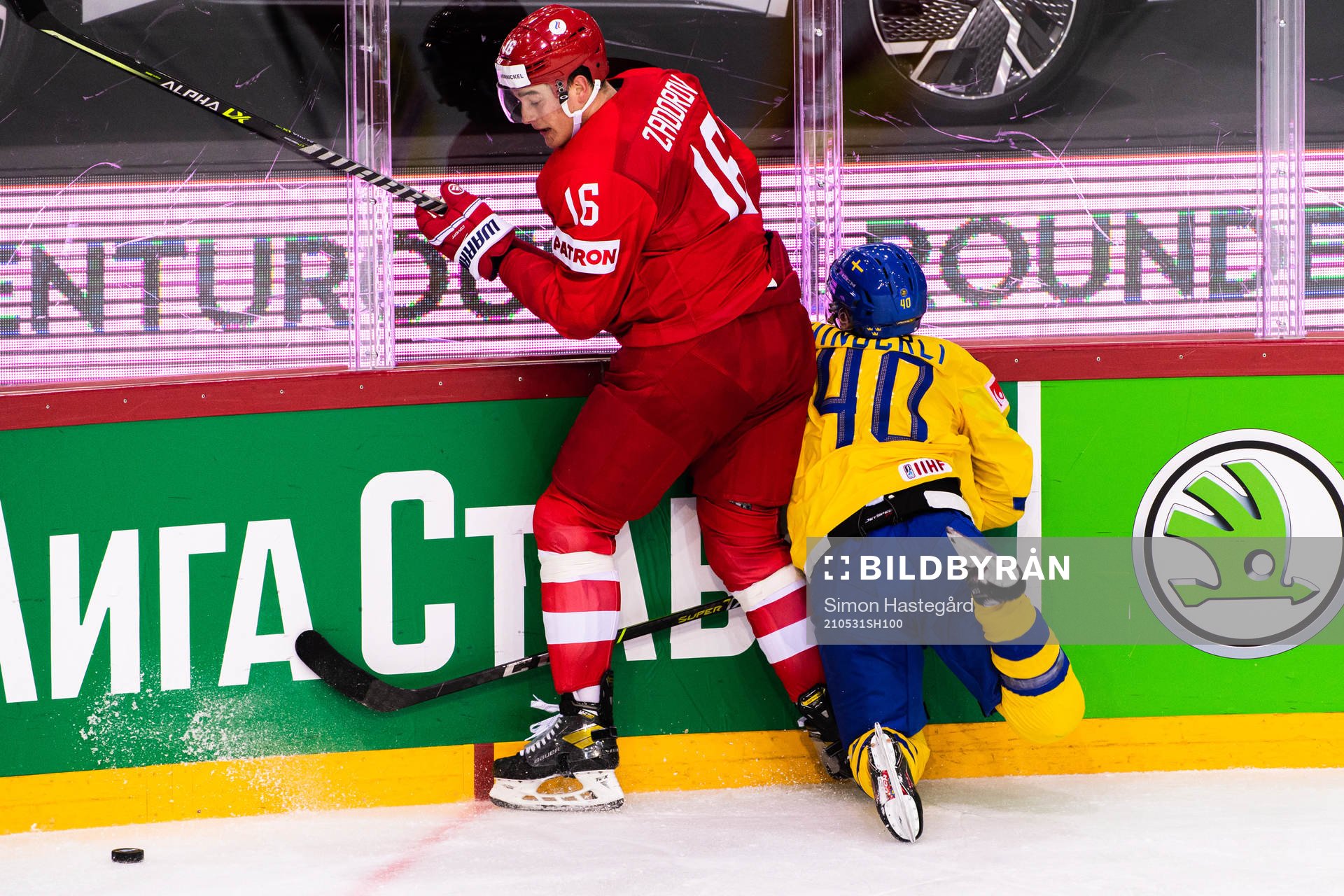 Nikita Zadorov of Russia and Andreas Wingerli of Sweden