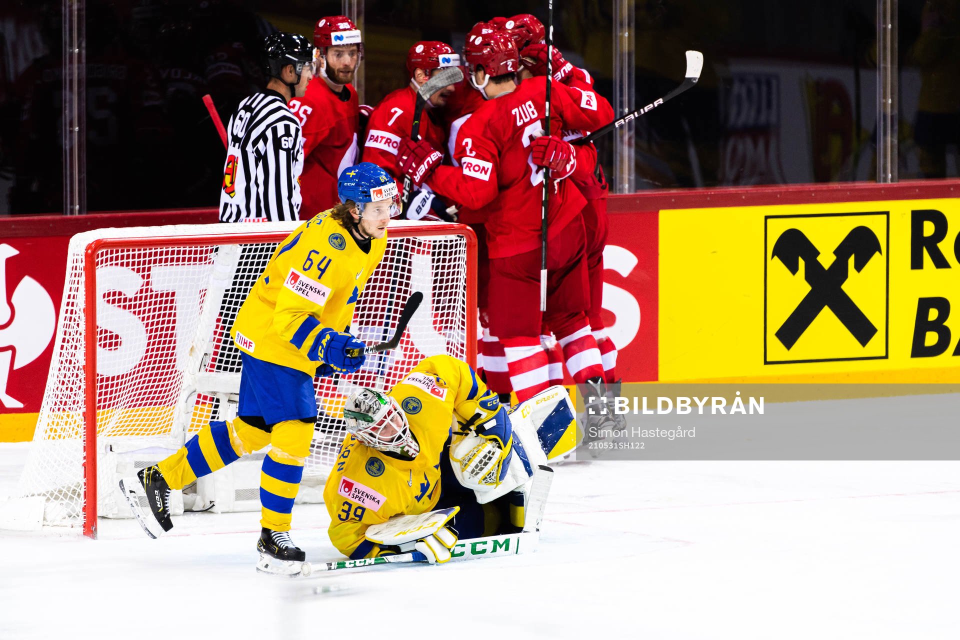 Goalkeeper Adam Reideborn and Jonathan Pudas of Sweden look