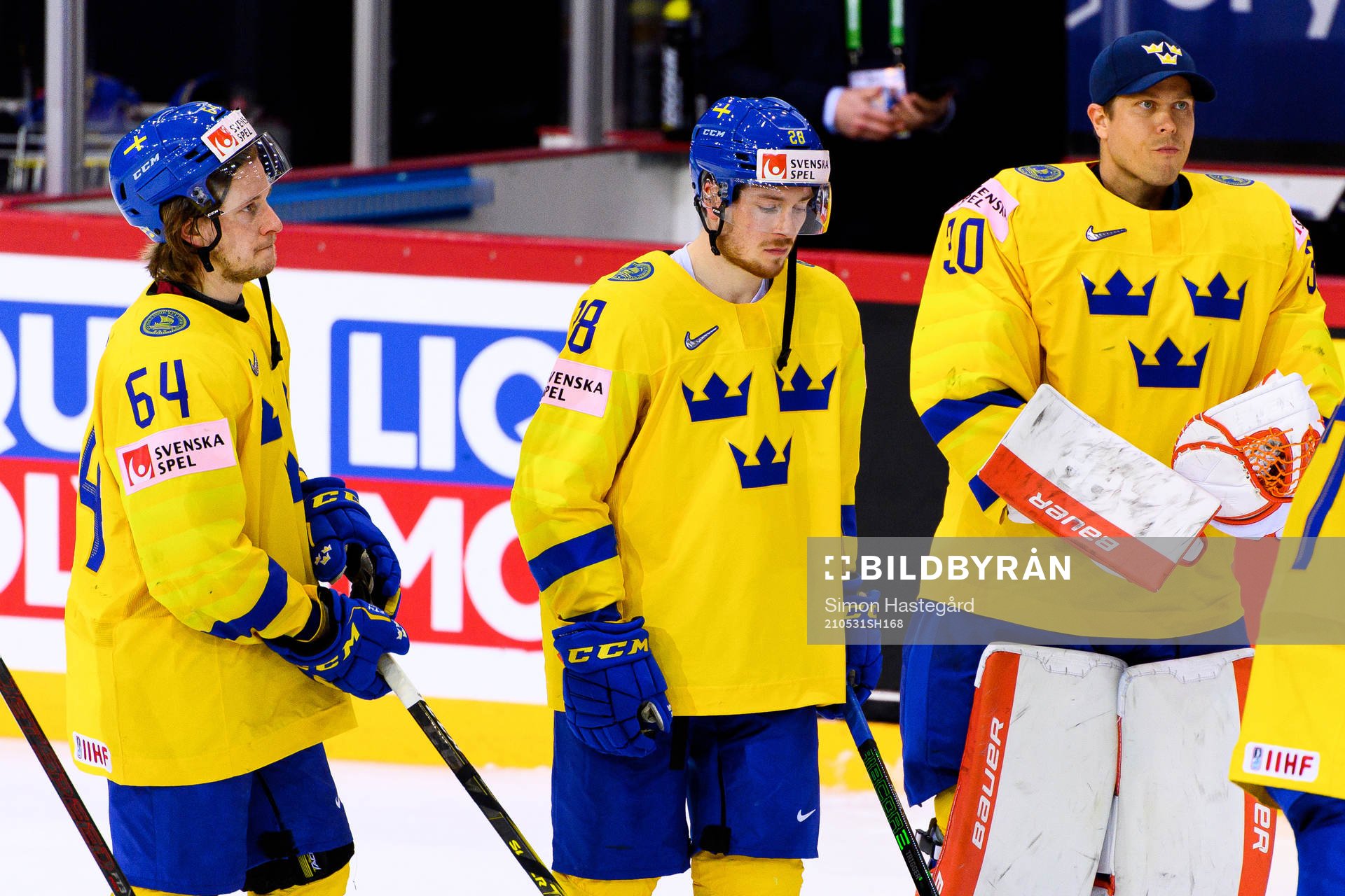 Jonathan Pudas and Jesper Frödén of Sweden look dejected