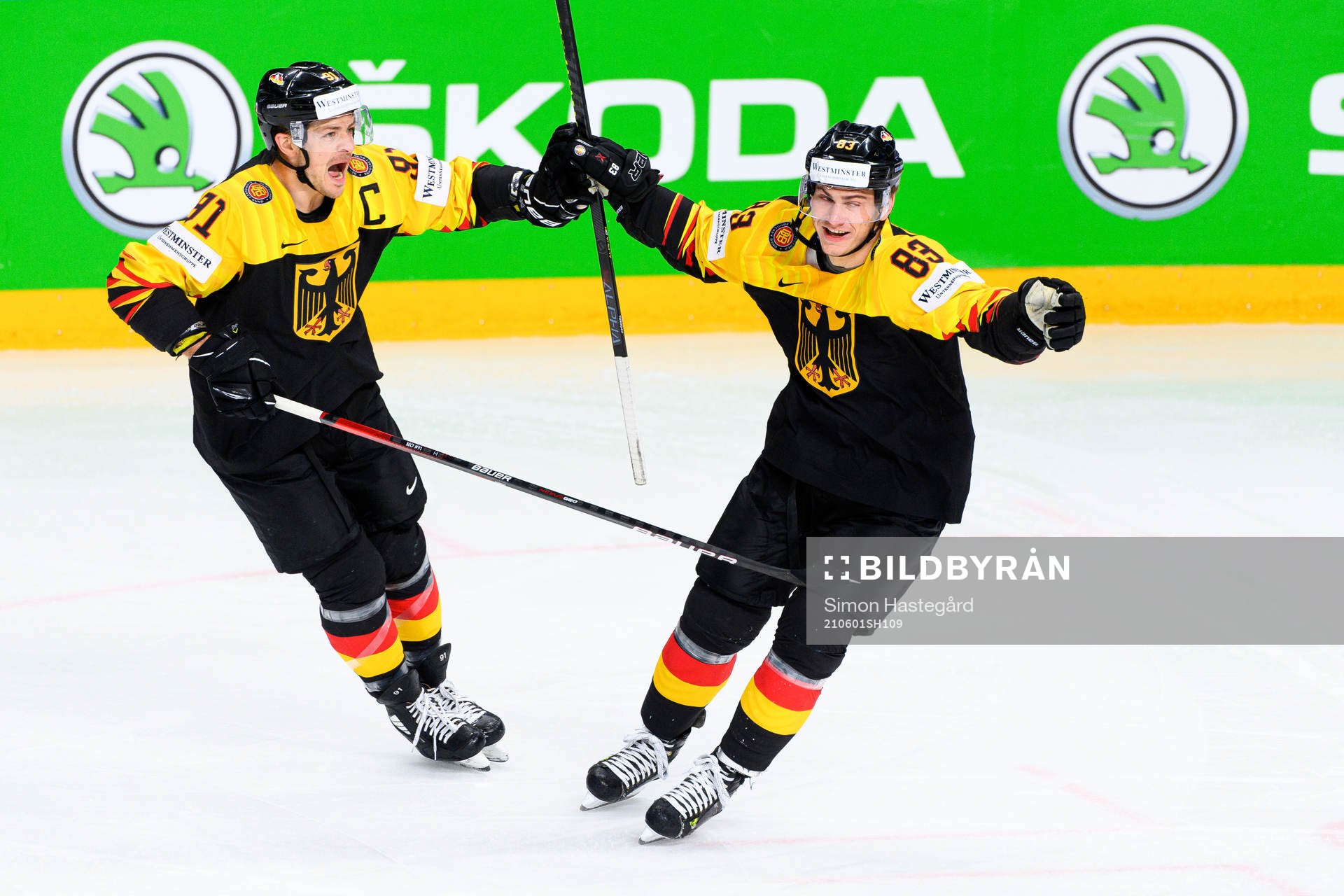 Moritz Muller and Leonhard Pfoderl of Germany celebrate the