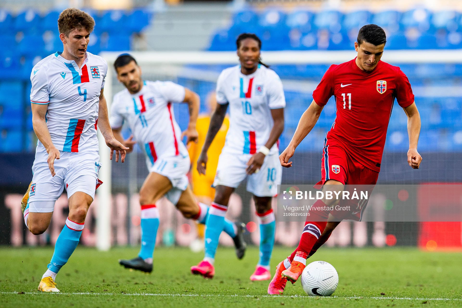 Florian Bohnert of Luxembourg and Mohamed Elyounoussi of