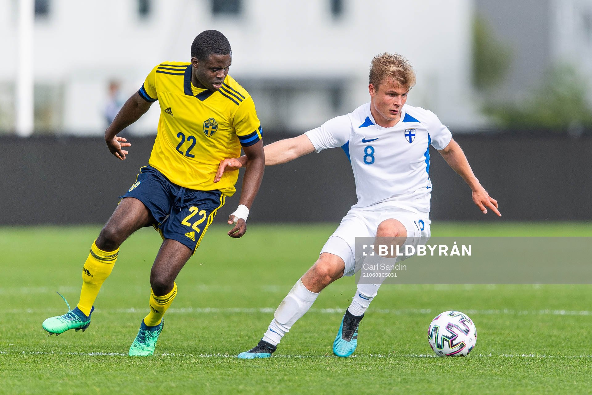Benjamin Mbunga Kimpioka of Sweden and Jaakko Oksanen of