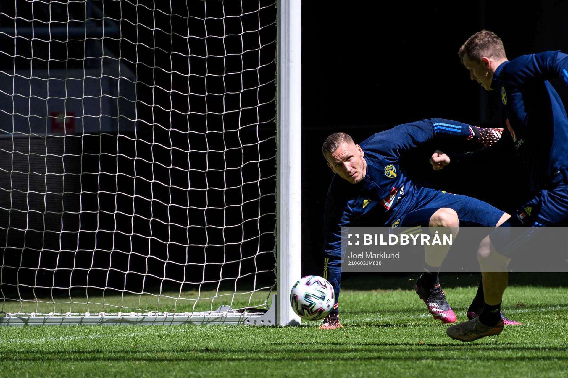 goalkeeper Robin Olsen and Emil Krafth of the Swedish